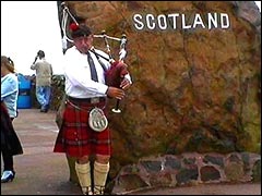 Bagpipe player on the England / Scotland border