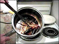 Burnt sausages in the saucepan
