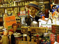 The rather chaotic counter in the Grocer's shop. How We Lived Then
