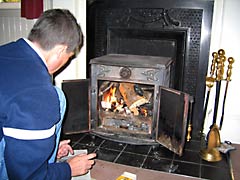 Trying to light the log burning stove