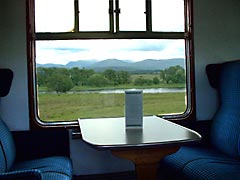 View of the River Spey and Cairngorm Mountains from the Strathspey Railway train