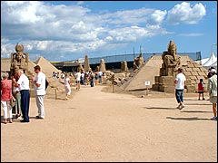 General view of visitors among the sand sculptures