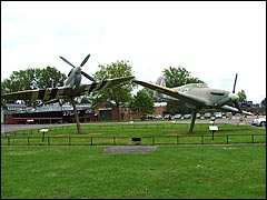 RAF Museum, Hendon: entrance with a Spitfire and Hurricane
