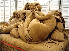 Sand sculpture depicting a Roman orgy