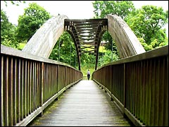 Wooden bridge over the River Banwy at Llanfair Caereinion, Wales