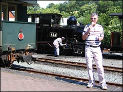 An ice cream and Welshpool Llanfair railway engine being oiled