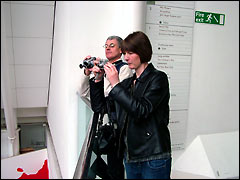 Tourists with cameras at the Imperial War Museum