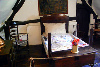 A short bed inside Anne Hathaway's Cottage, Stratford