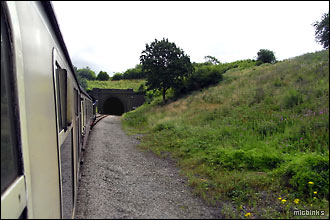 Steam train about to enter Greet Tunnel on the Gloucestershire Warwickshire Railway