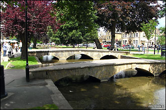 Low arched bridges on the River Windrush at Bourton on the Water, Gloucestershire