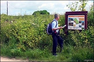 Checking the local Rinsey information on the notice board