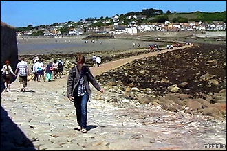 View along the causeway from St Michael's Mount to Marazion in Cornwall