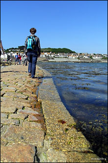 Incoming tide lapping the causeway between St Michael's Mount and Marazion