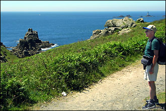 Cornwall: on the coast path at Land's End with Longships Lighthouse