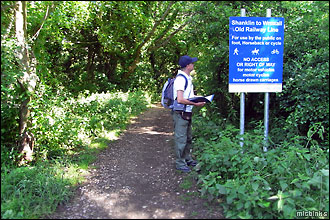 Checking the Sunshine Trail info board in Wroxall