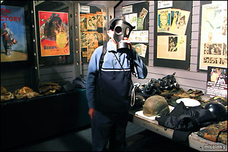 Trying out a wartime gas mask at London's Britain at War attraction