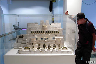 Admiring the model of MI6's HQ at Bond in Motion