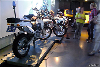Motorbikes and cars at the Bond in Motion exhibition