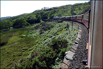 Ffestoniog Railway train travelling through the Snowdonia countryside