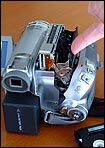 Dampening the camcorder's cassette opening mechanism with a handy finger