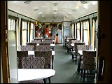 Mike received a call in the steam railway dining car