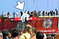 A Birdman jumps off Bognor Pier with an arrow strapped to his back (not to be mistaken with our arrow to point him out)