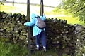 See a soggy Mike jump down from the stile on our rather wet walk along the Dale Way near Staveley